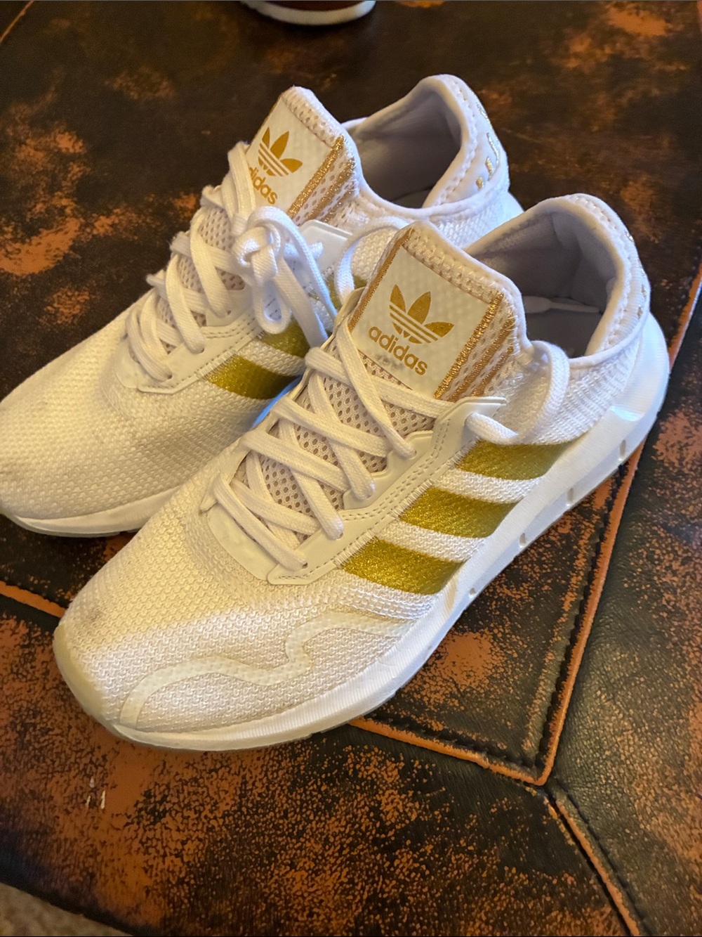 Ladies adidas White Sneakers with Gold Stripes